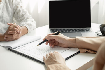 Business people hold a resume and talk to job applicants for job interviews about careers and Their personal history in the company. Recruitment concepts