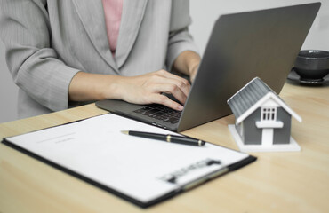 cagents working in real estate investment and home insurance signing contracts in accordance with the home buying insurance agreements approving purchases for clients