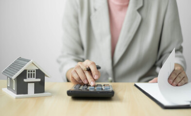 cagents working in real estate investment and home insurance signing contracts in accordance with the home buying insurance agreements approving purchases for clients