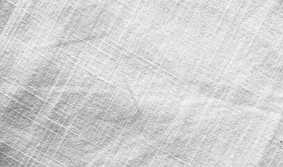 White or very light grey coloured burlap or canvas like checkered grunge rustic backgrounds with narrow or fine checks and vignetting
