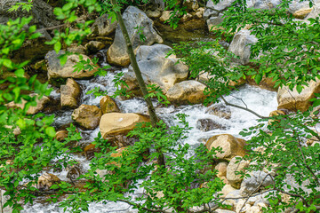The scenic views of Ahmetler Kanyonu, situated along the River Karpuzçay, a mystical place where sculpted sandstone rocks tower above you and crystalline springs gush from nowhere in Antalya, Turkey