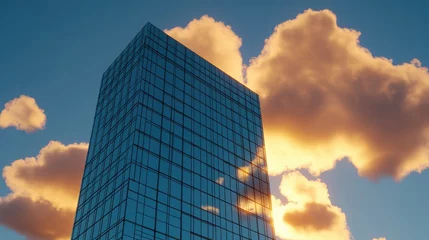 Modern Glass Building at Sunset with Dramatic Cloud Formation © Sudarat