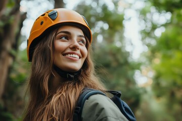 Young woman ziplining through green forest landscape