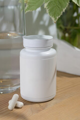 Mockup of a tube for medical products or vitamins.  Mockup of product packaging. Empty tube with space for logo and text.