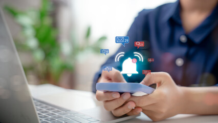 Mobile notification concept depicting new alerts from email, chat, and social media apps on a...