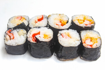 a bunch of sushi isolated on a white background