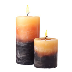 Decorative candles with gradient colors illuminating a cozy indoor space during the evening hours
