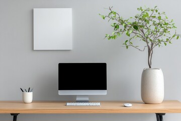 Minimalist modern desk setup with one artwork, clean surface, and simple keyboard reflecting lagom balance