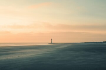 Serene coastal sunrise with solitary lighthouse