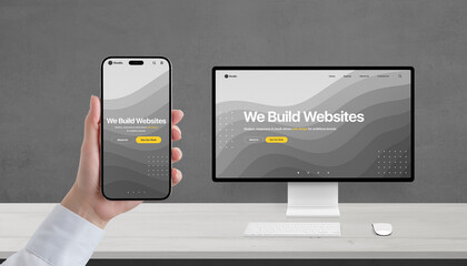 Responsive web design concept on phone and computer, studio portfolio page with 'We build websites'...