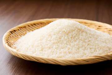 Serving raw Japanese rice in a bamboo sieve
