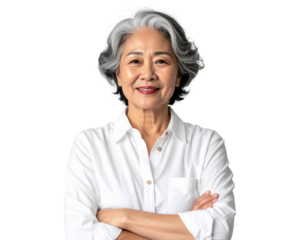 Beautiful senior Asian woman with gray hair wearing a white shirt, arms crossed, standing  isolated on a transparent background