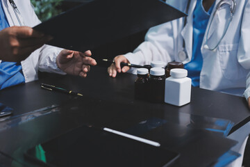 Team of professional doctors having meeting in office