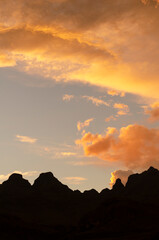 Sunset over the Drakensberg Mountains near the Cathedral Peak section of the Ukhahlamba Drakensberg Park. KwaZulu Natal. South Africa.
