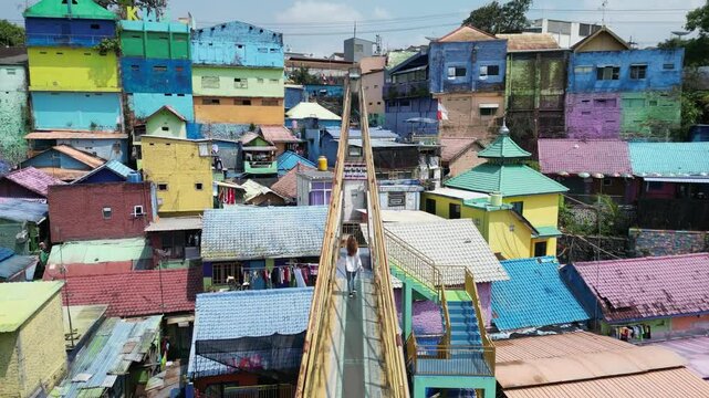 Bridge and houses in Malang colorful city - Jodipan on Java Island, Indonesia.