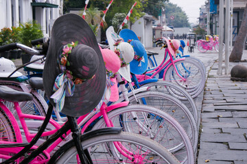 Colorful bicycles for rent in the courtyard of the Batavia Museum at Jakarta Old Town or Kota Tua,...