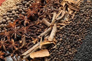 Many different spices as background, closeup view