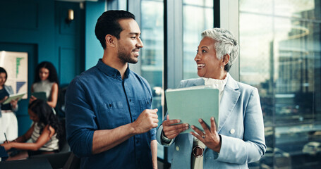 Talking, mature or business people on tablet in office for research, project or accounting proposal. Financial growth, finance analysts or news update for budget report, economy or review investment