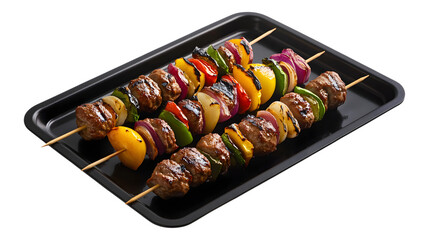 Grilled skewers of marinated meat and colorful vegetables isolated on a white background