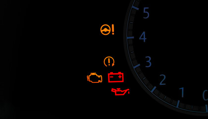 Car Warning Lights, Illuminated dashboard warning lights in a vehicle, including check engine, battery, low oil pressure, steering wheel, and tire pressure indicators.