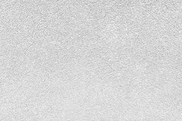 Grainy texture of asphalt, plaster, cement, plastic, rock, stone close up, macro. Background of white colored granular wall surface, rough backdrop