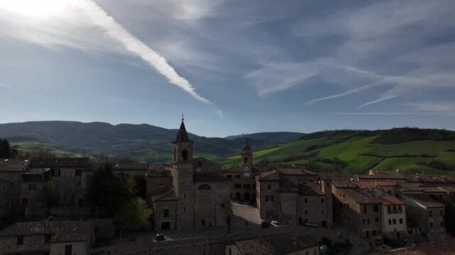 Historic Village of Belforte del Chienti with Mountain Backdrop