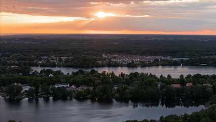 Heiligensee and Havel River at Sunset Before Summer, Aerial view of Heiligensee with Havel River in the background as sunset colors meet approaching rain river landscape. Eco-conscious lakeside commun