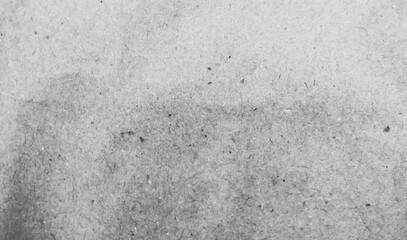 Blank empty textured rough rustic scuffed scratched light gray black and white messy dirty blotched horizontal vector background  like waste test printout page from photocopier or cemented plastered r