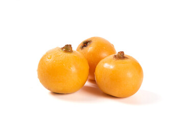 Ripe loquats fruit isolated on white background.