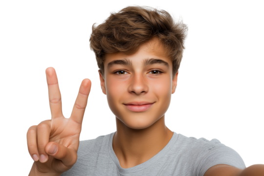 smiling young man holding up two fingers in peace sign isolated on white background