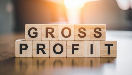 Gross profit wooden blocks on polished table in warm light business concept close-up view