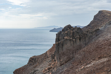 Stunning coastal view of Fuerteventura showcasing rugged cliffs and calm waters