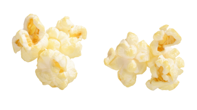 Close up of fluffy and light popcorn kernels isolated against a solid black background in high detail on transparent background