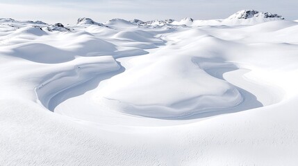 Shallow Stream Carving Through Flat Snowfield in a Cold Winter Landscape
