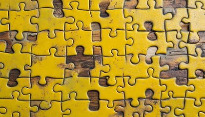 Unfinished puzzle on wooden table