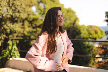 Caucasian young brunette long hair woman feeling sudden strong abdominal stomach ache gastritis...