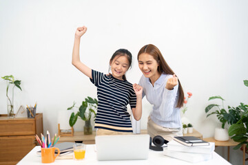 Back to School. Celebrating learning success with a joyful student and teacher.
