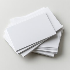 Stacks of Blank White Paper Sheets on a Light Neutral Background for Creative Use