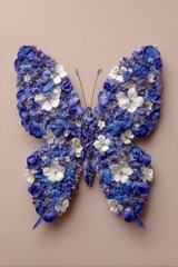 Floral Butterfly Art Composition Made of Blue and White Flowers Flat Lay Still Life on Neutral Background