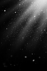 Obraz premium Abstract black background with light rays and particles