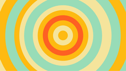 Concentric circles in shades of yellow orange and teal creating a retro and hypnotic abstract design