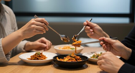 Shared meal with shiny utensils