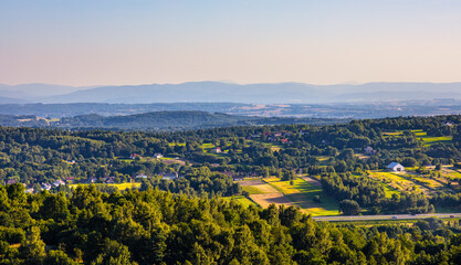Panoramic view of Jurassic Highland with Puszcza Dulowska Forest and Beskidy Mountains in background seen from Rudno village near Cracow in Lesser Poland