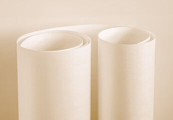 A roll of paper in a light beige tone.