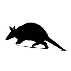 Solid black silhouette of an armadillo rolling