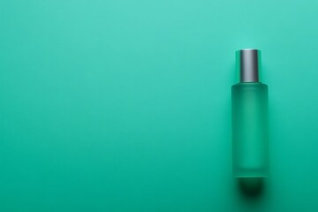 Elegant green perfume bottle studio shot