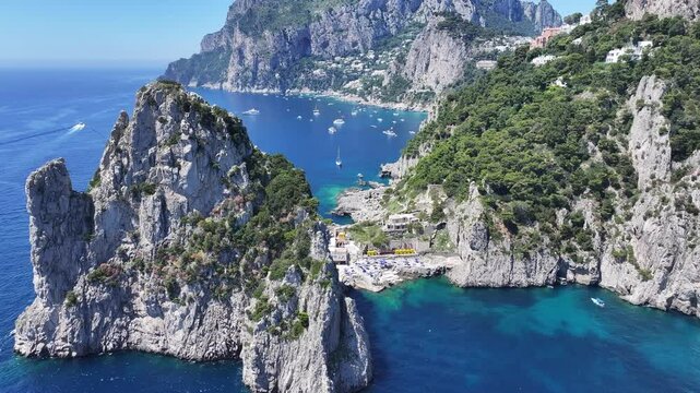 Faraglioni Of Capri At Naples In Campania Italy. Coastal Landscape. Waterfront Scene. Faraglioni Of Capri At Naples In Campania Italy. Beach Scenery. Paradisiac Seafront. Capri Island Skyline.