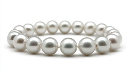 Obraz premium A white pearl bracelet with a white background