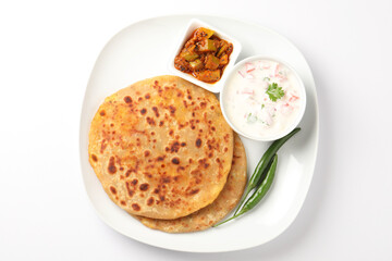 Aloo paratha, Famous Indian dish served with raita and pickle 