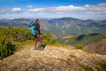 Woman with Backpack Hiking in the Low Tatras Mountains